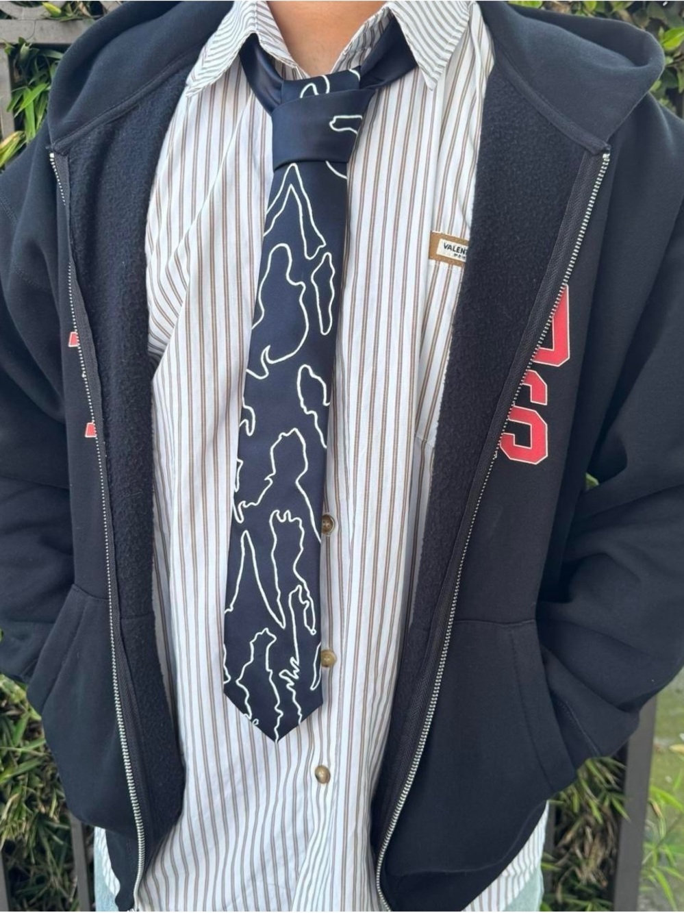 Hand painted tie with topographic inspired camo pattern